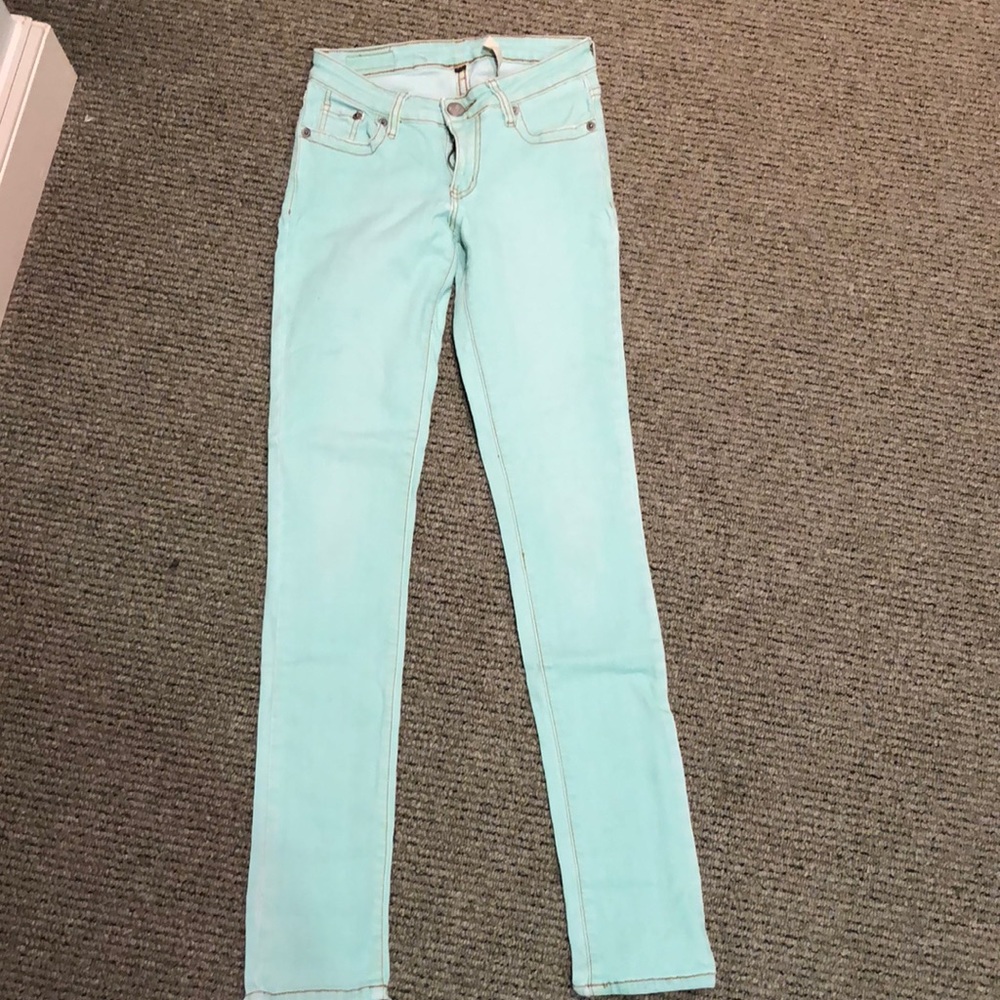 Light teal faded jeans
